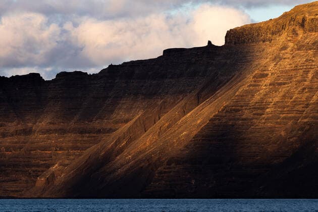 Creative Highlights World Majestic view of rough and high cliffs on seashore with ocean JairoDiaz_SummerSeaLandscapes_5.jpg Copyright: xJairoxDiazx Model Released