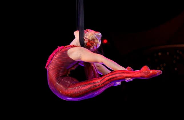 May 10, 2022, Montreal, PQ, Canada: An artist performs on aerial straps during a preview of the Cirque du Soleil show Kooza in Montreal on Tuesday, May 10, 2022. Montreal Canada  - ZUMAc35_ 20220510_zaf_c35_101 Copyright: xPaulxChiassonx