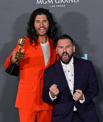 Shay Mooney and Dan Smyers of Dan + Shay appear backstage with their award during the annual Billboard Music Awards held at the MGM Grand Garden Arena in Las Vegas on May 15, 2022. The musicians were honored as Top Country Duo Group.  LAV202205150629 JIMxRUYMEN