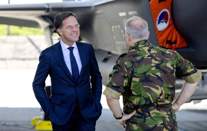 2022-05-16 11:07:50 GRAF IGNATIEVO - Prime Minister Mark Rutte with an F-35 at the Graf Ignatievo Air Base. Rutte is visiting Bulgaria for a meeting with the Dutch soldiers who participate in the NATO force there. Rutte also speaks with the Bulgarian Prime Minister Kiril Petkov, where the war in Ukraine is at the top of the agenda in the conversation between the two prime ministers. ANP ROBIN VAN LONKHUIJSEN netherlands out - belgium out *** 2022 05 16 11 07 50 GRAF IGNATIEVO Prime Minister Mark Rutte with an F 35 at the Graf Ignatievo Air Base Rutte is visiting Bulgaria for a meeting with the Dutch soldiers who participate in the NATO force there Rutte also speaks with the Bulgarian Prime Minister Kiril Petkov, where the war in Ukraine is  Copyright: xx x448641002x originalFilename: 448641002.jpg