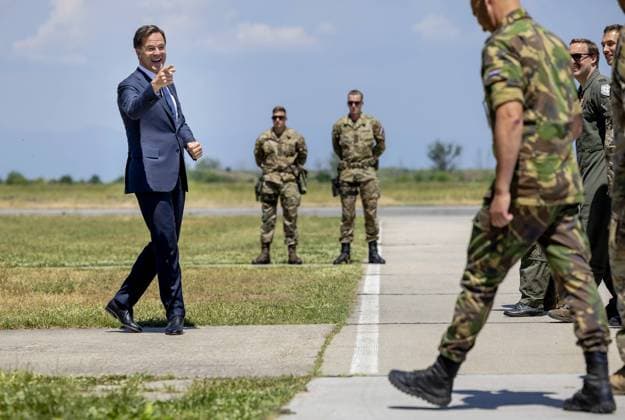 2022-05-16 11:43:33 GRAF IGNATIEVO - Prime Minister Mark Rutte speaks with the military at Graf Ignatievo Air Base. Rutte is visiting Bulgaria for a meeting with the Dutch soldiers who participate in the NATO force there. Rutte also speaks with the Bulgarian Prime Minister Kiril Petkov, where the war in Ukraine is at the top of the agenda in the conversation between the two prime ministers. ANP ROBIN VAN LONKHUIJSEN netherlands out - belgium out *** 2022 05 16 11 43 33 GRAF IGNATIEVO Prime Minister Mark Rutte speaks with the military at Graf Ignatievo Air Base Rutte is visiting Bulgaria for a meeting with the Dutch soldiers who participate in the NATO force there Rutte also speaks with the Bulgarian Prime Minister Kiril Petkov, where the wa  Copyright: xx x448641047x originalFilename: 448641047.jpg
