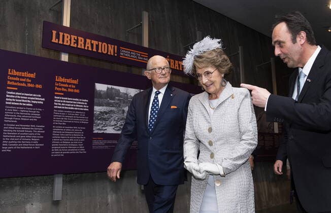 May 16, 2022, Ottawa, ON, CAN: Princess Margriet of the Netherlands, and with her husband, professor Pieter van Vollenhoven Jr., tour an exhibit on CanadaöÄÃ s role in the liberation of the Netherlands during the Second World War by The Canadian War MuseumöÄÃ s Dean F. Oliver, right, during a visit in Ottawa, on Monday, May 16, 2022. Princess Margriet is visiting Ottawa, the city where she was born during the Second World War. The princess was born at the Ottawa Civic Hospital after the Dutch royal family fled to Canada to escape Nazi occupying forces in 1940. Ottawa CAN - ZUMAc35_ 20220516_zaf_c35_014 Copyright: xJustinxTangx