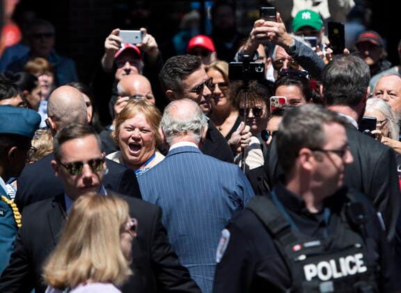 May 18, 2022, Ottawa, ON, Canada: A member of the public reacts as they greet Prince Charles as he visits the ByWard Market in Ottawa, during their Canadian Royal tour, on Wednesday, May 18, 2022. Ottawa Canada  - ZUMAc35_ 20220518_zaf_c35_055 Copyright: xJustinxTangx
