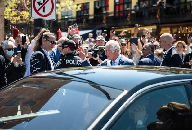May 18, 2022, Ottawa, ON, Canada: Prince Charles waves to members of the public as he returns to his vehicle after a visit to the ByWard Market in Ottawa, during their Canadian Royal tour, on Wednesday, May 18, 2022. Ottawa Canada  - ZUMAc35_ 20220518_zaf_c35_052 Copyright: xJustinxTangx