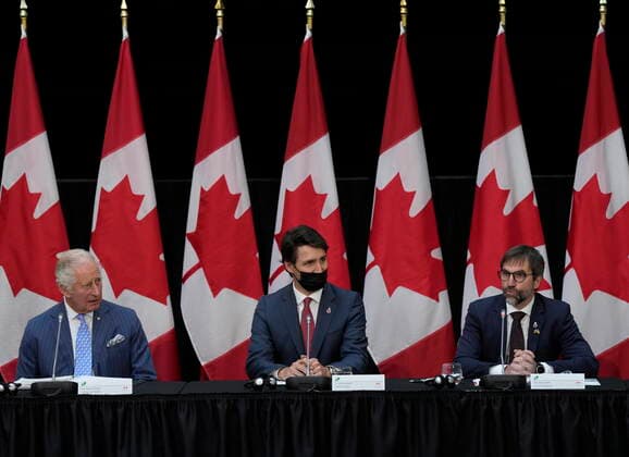May 18, 2022, Ottawa, ON, Canada: Prince Charles, Prime Minister Justin Trudeau and Environment Minister Steven Guilbeault (right) take part in a sustainable finance roundtable meeting in Ottawa as part of the Canadian Royal Tour, Wednesday, May 18, 2022. Ottawa Canada  - ZUMAc35_ 20220518_zaf_c35_157 Copyright: xPaulxChiassonx