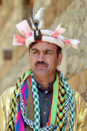 Pakistan: Chilmjushi Festival in the Kalsh Valley Kalashi women and men wearing traditional dresses participating in the dance during the Chilmjushi Festival in the Kalsh Valley. Chilum Joshi is also known as a Kalash spring festivals. Dressed up in newly knitted clothes with elaborate headgear and jewelry in vibrant colors , Kalasha women dance to traditional drumbeats during the chilum joshi festivals that concluded here at the scenic Bamburet valley on Sunday with fanfare. The four days event attracted an unprecedented number of tourists including a group of 22 Malaysian motorcyclists, besides the French, Australian and Italian nationals, on the concluding day of the festival young men women select their life partners while each day f Copyright: RanaxSajidxHussain