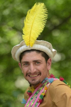 Pakistan: Chilmjushi Festival in the Kalsh Valley Kalashi women and men wearing traditional dresses participating in the dance during the Chilmjushi Festival in the Kalsh Valley. Chilum Joshi is also known as a Kalash spring festivals. Dressed up in newly knitted clothes with elaborate headgear and jewelry in vibrant colors , Kalasha women dance to traditional drumbeats during the chilum joshi festivals that concluded here at the scenic Bamburet valley on Sunday with fanfare. The four days event attracted an unprecedented number of tourists including a group of 22 Malaysian motorcyclists, besides the French, Australian and Italian nationals, on the concluding day of the festival young men women select their life partners while each day f Copyright: RanaxSajidxHussain