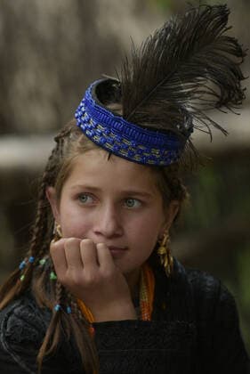 Pakistan: Chilmjushi Festival in the Kalsh Valley Kalashi women and men wearing traditional dresses participating in the dance during the Chilmjushi Festival in the Kalsh Valley. Chilum Joshi is also known as a Kalash spring festivals. Dressed up in newly knitted clothes with elaborate headgear and jewelry in vibrant colors , Kalasha women dance to traditional drumbeats during the chilum joshi festivals that concluded here at the scenic Bamburet valley on Sunday with fanfare. The four days event attracted an unprecedented number of tourists including a group of 22 Malaysian motorcyclists, besides the French, Australian and Italian nationals, on the concluding day of the festival young men women select their life partners while each day f Copyright: RanaxSajidxHussain