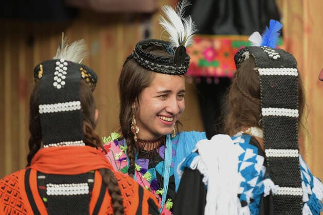 Pakistan: Chilmjushi Festival in the Kalsh Valley Kalashi women and men wearing traditional dresses participating in the dance during the Chilmjushi Festival in the Kalsh Valley. Chilum Joshi is also known as a Kalash spring festivals. Dressed up in newly knitted clothes with elaborate headgear and jewelry in vibrant colors , Kalasha women dance to traditional drumbeats during the chilum joshi festivals that concluded here at the scenic Bamburet valley on Sunday with fanfare. The four days event attracted an unprecedented number of tourists including a group of 22 Malaysian motorcyclists, besides the French, Australian and Italian nationals, on the concluding day of the festival young men women select their life partners while each day f Copyright: RanaxSajidxHussain