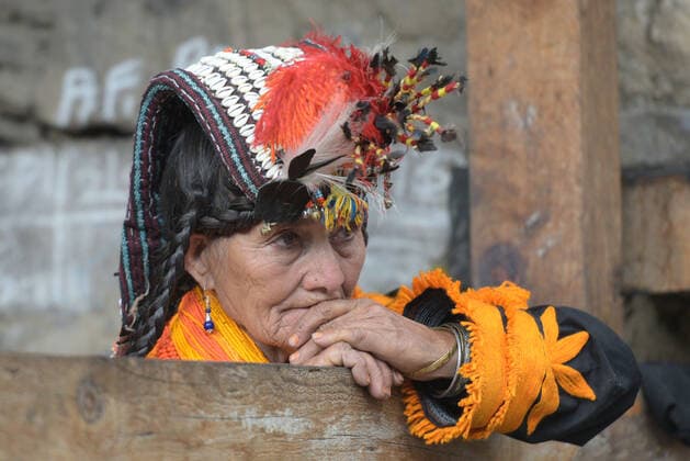 Pakistan: Chilmjushi Festival in the Kalsh Valley Kalashi women and men wearing traditional dresses participating in the dance during the Chilmjushi Festival in the Kalsh Valley. Chilum Joshi is also known as a Kalash spring festivals. Dressed up in newly knitted clothes with elaborate headgear and jewelry in vibrant colors , Kalasha women dance to traditional drumbeats during the chilum joshi festivals that concluded here at the scenic Bamburet valley on Sunday with fanfare. The four days event attracted an unprecedented number of tourists including a group of 22 Malaysian motorcyclists, besides the French, Australian and Italian nationals, on the concluding day of the festival young men women select their life partners while each day f Copyright: RanaxSajidxHussain