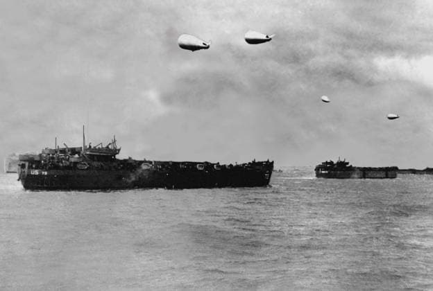 Allied landing craft approach Normandy (France) June 9,1944. Allied landing craft, protected from low-firing German planes by barrages balloons, move toward Normandy (France) June 9,1944, three days after D-Day . Copyright: xPhoto12 Coll-DITE USISx DIT01037_121