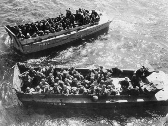 Landing crafts ready to land U.S. soldiers on the Normandy beaches (June 6, 1944) American troops in full battle equipment set out in landing craft from England s shores enroute to the Normandy beaches June 6, 1944 (D-Day) Copyright: xPhoto12 Coll-DITE USISx DIT01138_013