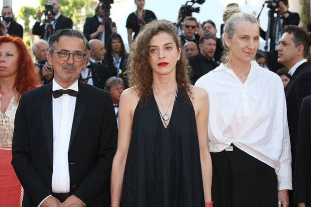75th Cannes Film Festival. Red carpet of the film Three thousand years of longing . Thanassis Karathanos, Hanna Bilobrova and Nadia Turincev. 280446 2022-05-20 Cannes France  Copyright: xIsabellexVautierx xStarfacex STAR_280446_064