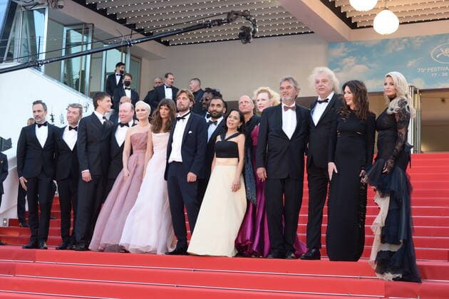 May 21, 2022, CANNES, France: CANNES, FRANCE - MAY 21: Director Ruben Östlund, Charlbi Dean, Henrik Dorsin, Vicki Berlin, Arvin Kananian, Woody Harrelson, Dolly De Leon, Sunnyi Melles, Zlatko Buric, Iris Berben, Ralph Schicha and Carolina Gynning attend the screening of Triangle Of Sadness during the 75th annual Cannes film festival at Palais des Festivals on May 21, 2022 in Cannes, France. CANNES France - ZUMAi09_ 20220521_zaf_i09_011 Copyright: xFrederickxInjimbertx