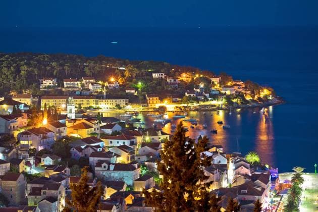 Island of Hvar town waterfront aerial evening view, Dalmatia region of Croatia , 32840310.jpg, hvar, island, pakleni, paklenski, islands, hellish, rock, blue, croatia, europe, ancient, architecture, dalmatia, view, adriatic, coast, waterfront, destination, tourist, bay, sea, ocean, yacht, panorama, croatian, town, panoramic, aerial, nautical, palmizana, yachting, sailing, hells, paklinski, boat, sailboat, holiday, nature, landscape, scene, fortification, landmark, travel, fortica, evening, sunset, vis, otoci