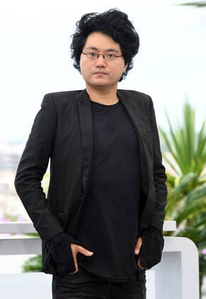 South Korean director Davy Chou attends the photo call for All The People I ll Never Be at Palais des Festivals at the 75th Cannes Film Festival, France on Monday, May 23, 2022.  CAN20220523115 RUNExHELLESTAD