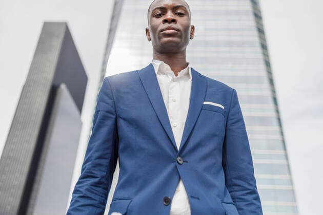 Creative Highlights Symbolbilder Young businessman in front of office building model released, Symbolfoto, IFRF01612
