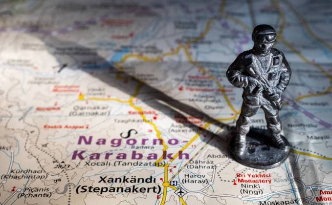 A figurine of an armed soldier on the map of Nagorno-Karabakh. , 34664922.jpg, politics, dramatic, warfare, nagorno karabakh, teritory, states, broken, memorial, region, republic, government, earth, isolated, explosion, agreement, competition, war, azerbaijan, conflict, armenia, karabakh, national, nagorno, country, world, fight, background, symbol, power, flag, patriotic, force, military, artsakh, battle, banner, flags, patriotism, crisis, caucasus, political, armed, attack, freedom, protection, guard