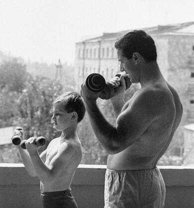 Azaryan Son Exercise 82719 01.06.1979 Two-time world and Olympic gymnastics champion Albert Azaryan (right) doing morning work-out together with his son. Yuriy Somov Sputnik Yerevan Armenia  Copyright: xYuriyxSomovx