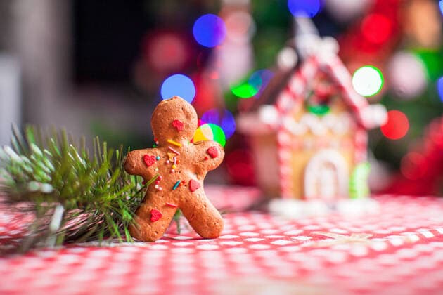 Gingerbread man in front of his candy ginger house background the Christmas tree lights , 10313804.jpg, ginger, gingerbread, decoration, nobody, dessert, sweet, decorated, seasonal, holiday, cookie, homemade, christmas, traditional, cute, season, fairytale, candy, gingerbread cookie, tasty, gingerbread house, tradition, colorful, cake, sugar, house, baked, food, celebration, xmas, holidays, time, lights, multicolored, fun, bright, multi-colored, bokeh, bake, bakery, biscuit, bread, brown, cooking, december, decor, glowing, home, light, merry, tree,