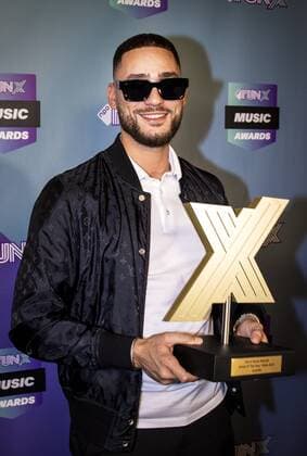 2022-06-02 22:55:39 AMSTERDAM - Josylvio wins the artist of the year male Award during the FunX Music Awards in AFAS Live in Amsterdam. During the award show, the most important music prizes of the young Netherlands were presented. ANP RAMON VAN FLYMEN netherlands out - belgium out