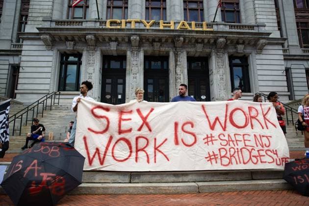 Newark: Sex Workers March Activists gathered at Military Park in Newark, NJ on June 2, 2022 and marched to City Hall for the Sex Workers March calling on elected officials, employers, and police to reform their practices to support equitable employment and housing opportunities for all people regardless of their sexuality or gender identity. June 2 also marks International Whores Day. Newark New Jersey United States  Copyright: xKarlaxAnnxCotex originalFilename: cotÃ -newarkse220602_npous.jpg