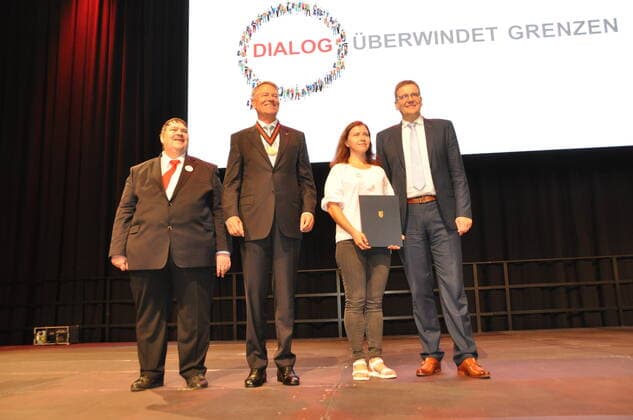 The Sudeten Germans awarded the European Charles IV Prize, their highest honour, to the presidents of Romania and Ukraine, Klaus Iohannis and Volodymyr Zelensky, at their congress in Hof, Bavaria, Germany, near the Czech border, on Saturday, June 4, 2022. Pictured here are (from left) Bernd Posselt, supreme leader of the Sudeten Germans, Romanian President Klaus Iohannis, Olga Kovalchuk as representative of the Ukrainians and Steffen Hortler, who is the regional chairman of the Bavarian part of the Sudeten German Regional Association. (CTKxPhoto AlesxZapotocky) CTKPhotoP2022060403195 