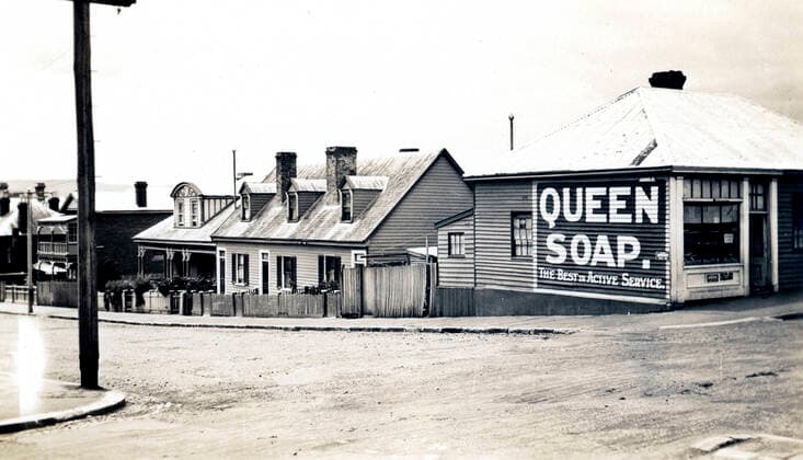 Hobart - Patrick Street near corner of Harrington Street. Shows house at 78 Patrick Street. Partial view of shop showing painted advertisement for Queen Soap (c1920) --- Mandatory Photo : TAHO 1062_05_M_-12261-