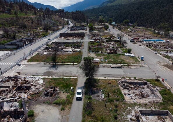 June 14, 2022, LYTTON, BC, CANADA: Structures that were destroyed by wildfire are seen in Lytton, B.C., on Tuesday, June 14, 2022. The fire-ravaged community of Lytton, B.C., will get $77 million from the federal government to help it rebuild a fire-resistant and energy-efficient community. Two people were killed and much of the centre of the village was destroyed when wildfire ripped through the community almost a year ago. LYTTON CANADA - ZUMAc35_ 20220614_zaf_c35_088 Copyright: xDarrylxDyckx