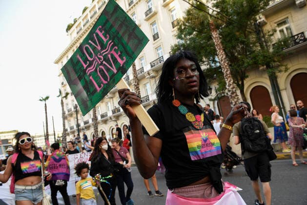 June 18, 2022, Athens, Greece: People march waving rainbow flags and holding placards, during the Athens Pride anual parade. Thousands demonstrated during the Athens Pride 2022 parade to raise awareness, elevate the visibility of LGBTQ persons in Greek society and defend their rights against sexual discrimination. Athens Greece - ZUMAg221 20220618_zap_g221_031 Copyright: xNikolasxGeorgioux