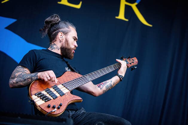 Jinjer live at Copenhell 2022, Copenhagen, Denmark Copenhagen, Denmark. 18th, June 2022. The Ukrainian heavy metal band Jinjer performs a live concert during the Danish heavy metal festival Copenhell 2022. Here bass player Eugene Abdukhanov is seen live on stage. Copenhagen Denmark  Copyright: xGonzalesxPhoto SebastianxDammarkx