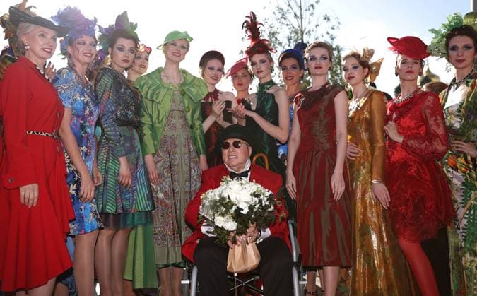 MOSCOW, RUSSIA - JUNE 20, 2022: Russian fashion designer Vyacheslav Zaitsev (C) is seen after a catwalk show for his collection as part of the Moscow Fashion Week in Zaryadye Park. Sergei Bobylev TASS  TS137060