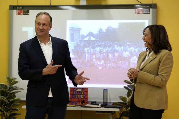 U.S. Vice President Kamala Harris and second gentleman Doug Emhoff greet children at an art class as she visits the National Museum of African American History and Culture to mark a Juneteenth in Washington, DC on Monday, June 20, 2022.  WASP20220620107 YurixGripas