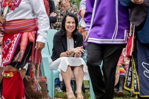 June 21, 2022, Montreal, QC, Canada: The Mayor of Montreal ValÃˆrie Plante watching the presentation of an Indigenous dance during the celebrations of summer solstice. During this summer solstice, Canadians celebrated the 26th National Indigenous Peoples Day. Many members of the First Nations of Turtle Island (Montreal), Kahnawake and beyond, danced and shared their stories during the seasonal transition in several events throughout the city. Speaking in Kanien keha before French or English, the Indigenous highlighted their culture and traditions in Old Montreal. Montreal Canada - ZUMAs197 20220621_zaa_s197_452 Copyright: xGiordannoxBrumasx