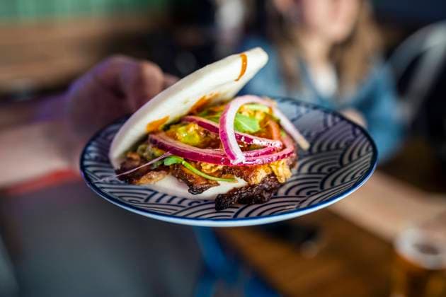 Waitress holding plate with food at restaurant model released, Symbolfoto property released, JSRF02056