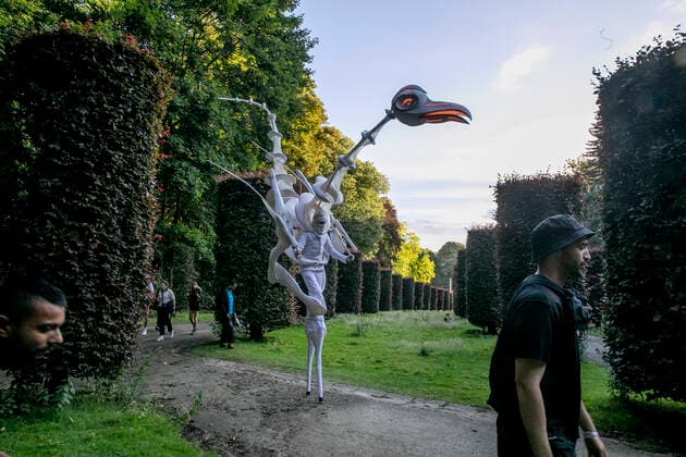 Illustration picture shows a street art performer carrying a fantasy bird costume, during the first day of the Couleur Cafe music festival in Brussels, Friday 24 June 2022. The 31st edition of the festival is taking place from June 24th to June 26th.  HATIMxKAGHAT 36610394