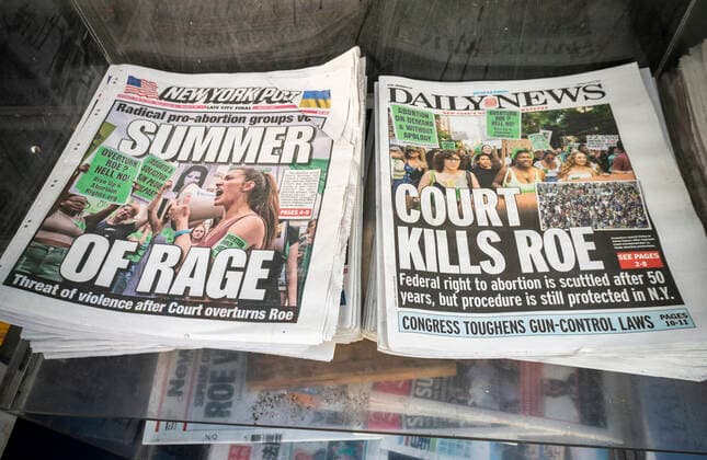 Newpaper headlines on overturning Roe v. Wade Front page headlines of newspapers in New York on Saturday, July 25, 2022 report on the previous days™ ruling by the U.S. Supreme Court overturning Roe v. Wade.(  RichardxB.xLevine