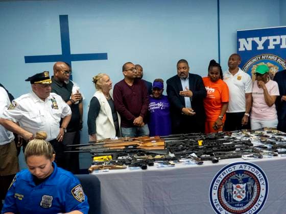 June 25, 2022, New York, NY, USA: NYPD and the community working together to keep us safe, Manhattan District Attorney Alvin Bragg said at a church in Harlem. Turn in up to five weapons in exchange for gift cards worth from $50 to $500, depending on the type of gun such as revolver, pistol, rifle, or shotgun. New York USA - ZUMAm57_ 20220625_zaf_m57_075 Copyright: xJohnxMarshallxMantelx