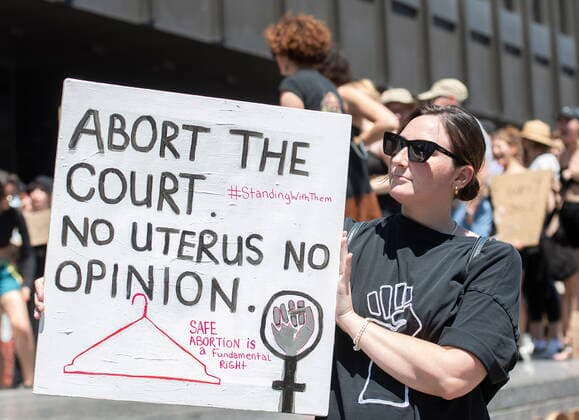 June 26, 2022, Montreal, PQ, Canada: People take part in a protest to denounce the United States Supreme Court s decision to overturn the law that provided the constitutional right to abortion for almost 50 years, in Montreal, Sunday, June 26, 2022. Montreal Canada  - ZUMAc35_ 20220626_zaf_c35_034 Copyright: xGrahamxHughesx