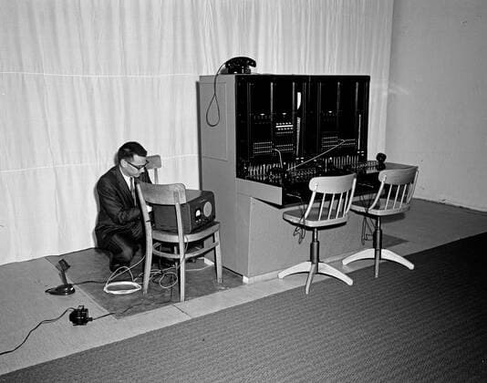 Trip to Europe: Arrival in Vienna, Austria 10:50AM; White House Army Signal Agency (WHASA) staff in Vienna. An unidentified man works on White House Army Signal Agency (WHASA) equipment in preparation for a summit between President John F. Kennedy and Soviet Union Premier Nikita Khrushchev in Vienna, Austria. Copyright: xpiemagsx