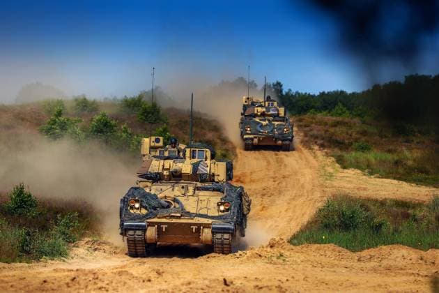 June 16, 2022 - Drawsko Pomorskie, Poland - U.S. M2 Bradley Fighting Vehicles assigned to 1st Battalion, 68th Armor Regiment, 3rd Armored Brigade Combat Team, 4th Infantry Division, maneuver towards a situational training exercise lane at Drawsko Pomorskie, Poland, June 16, 2022. The 3 4 ABCT is among other units assigned to V Corps, Americas forward deployed corps in Europe that works alongside NATO allies and regional security partners. Drawsko Pomorskie Poland - ZUMAz03_ 20220616_stw_z03_410 Copyright: xU.S.xArmyx