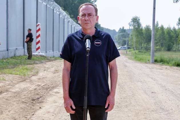 June 30, 2022, Nowodziel, Poland: Minister of Interior, Mariusz Kaminski speaks during a press conference that marks the end of building of the physical barriers between Poland and Belarus. The Polish government decided to build a 186 kilometre long and 5.5 meter high steel barrier with barbed wire on the Polish - Belarus border, which is as well the border of the European Union and NATO. The decision was made after thousands of migrants, mainly from Syria, Iraq and Afghanistan tried to cross into Poland from Belarus. The government of Belarus was accused of orchestrating the migration, with help from Russia. The pressure on the Polish border is today seen as the first step of a larger plan of Vladimir Putin, the Russian president, to de - ZUMAs197 20220630_zab_s197_034 Copyright: xDominikaxZarzyckax