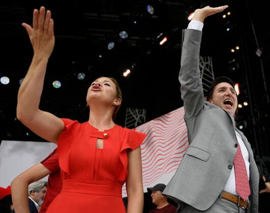 July 1, 2022, Ottawa, ON, CAN: Prime Minister Justin Trudeau and his wife Sophie Gregoire Trudeau wave as they leave at the conclusion of Canada Day celebrations at Lebreton Flats in Ottawa, on Friday, July 1, 2022. Ottawa CAN  - ZUMAc35_ 20220701_zaf_c35_036 Copyright: xJustinxTangx