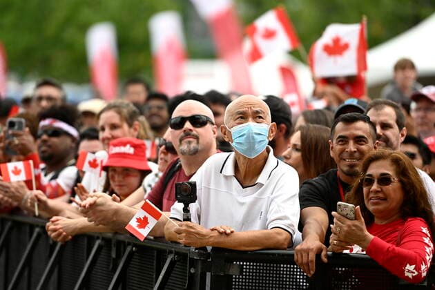 July 1, 2022, Ottawa, ON, CAN: People look towards the stage during Canada Day celebrations at Lebreton Flats in Ottawa, on Friday, July 1, 2022. Ottawa CAN  - ZUMAc35_ 20220701_zaf_c35_049 Copyright: xJustinxTangx