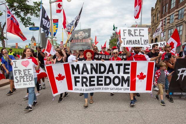 July 1, 2022, Ottawa, Ontario, Canada: People protest and march on Wellington street against COVID-19 health measures during Canada Day in Ottawa, Ontario, on Friday July 1, 2022. Ottawa Canada  - ZUMAc35_ 20220701_zaf_c35_169 Copyright: xLarsxHagbergx