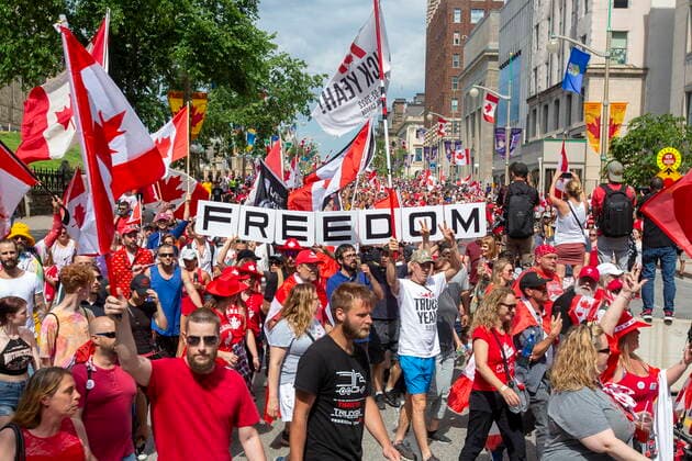 July 1, 2022, Ottawa, Ontario, Canada: People protest and march on Wellington street against COVID-19 health measures during Canada Day in Ottawa, Ontario, on Friday July 1, 2022. Ottawa Canada  - ZUMAc35_ 20220701_zaf_c35_170 Copyright: xLarsxHagbergx