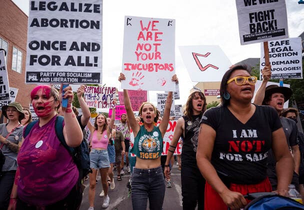 July 1, 2022, USA: People march with signs on Central Avenue during the Emergency March: Abortion Access in All 50 States in Albuquerque, New Mexico on Friday, July 1, 2022. Over 50 people gathered to rally and march in demand of President Biden to take immediate emergency action for abortion rights. The event was hosted by the Party for Socialism and Liberation. USA - ZUMAab1_ 20220701_zaf_ab1_007 Copyright: xAlbuquerquexJournalx