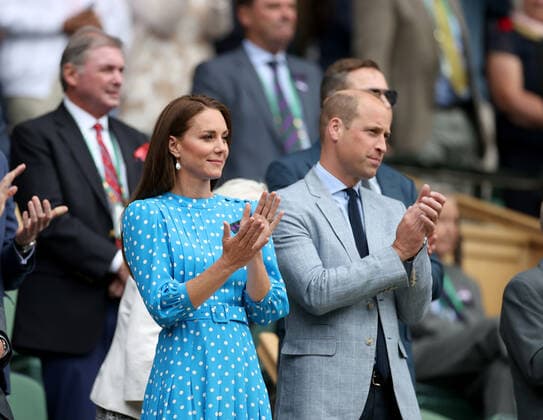 (220706) -- LONDON, July 6, 2022 -- Britain s Prince William (R, front), Duke of Cambridge, and his wife Catherine (L, front), Duchess of Cambridge, applaud in the royal box during the men s singles quarter-final match between Novak Djokovic of Serbia and Jannik Sinner of Italy at Wimbledon Tennis Championship in London, Britain, on July 5, 2022. ) (SP)BRITAIN-LONDON-TENNIS-WIMBLEDON-MEN S SINGLES-QUARTERFINALS LixYing