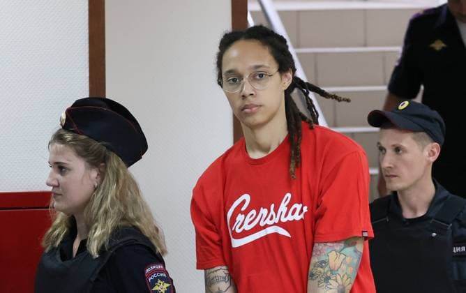 MOSCOW REGION, RUSSIA â€“ JULY 7, 2022: US Olympic champion basketball player Brittney Griner (C) charged with drug smuggling arrives for a hearing at the Khimki City Court. She is remanded in custody until December 20 for attempting to smuggle hash oil through Sheremetyevo International Airport. Sergei Savostyanov TASS  TS139437