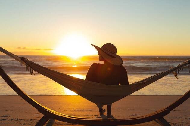 Creative Highlights Symbolbilder Mixed race woman on beach holiday sitting in hammock during sunset Mixed race woman on beach holiday sitting in hammock during sunset. healthy outdoor leisure time by the sea., model released, , property released, Cape Town, South Africa, 23.02.2021, 1423253.jpg, people,mixed race,woman,beach holiday,sitting,hammock,sunset,healthy,outdoor,leisure time,sea,ocean,summer,beach,water,nature,landscape,vacation,sky,travel,sun,lifestyle,coast,beautiful,sunrise,tourism,view,natural,young,health,blue,mixed,race,holiday,leisure,time Young Adult,Woman,Female,Indian